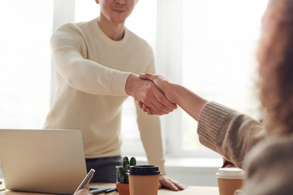 Utah business meeting where man shakes hand