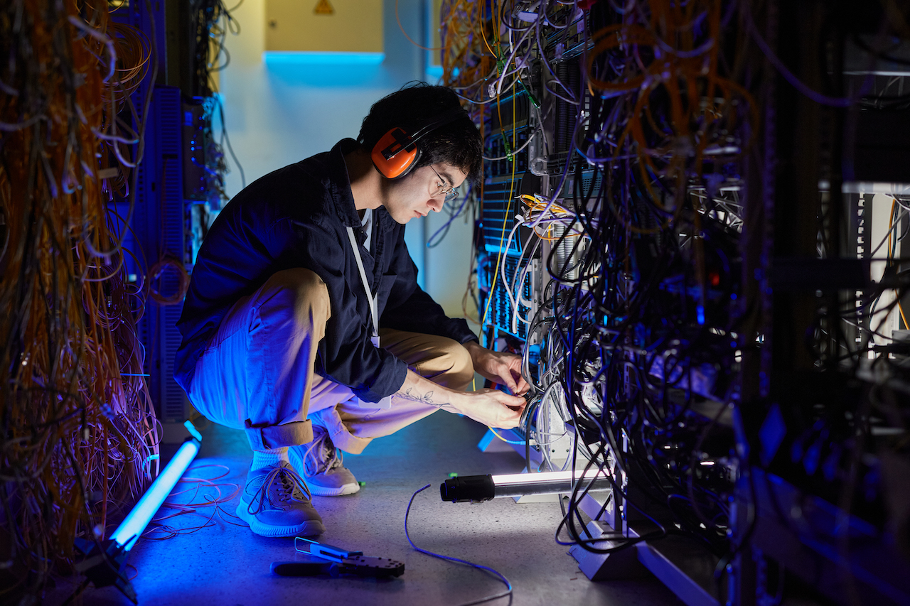 IT specialist optimizing a network for a business