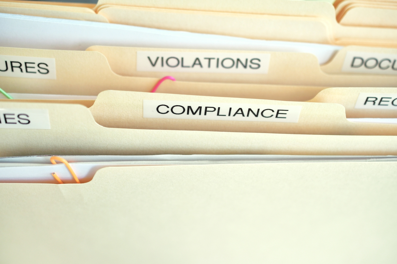 ITAR regulations compliance folder among other folders