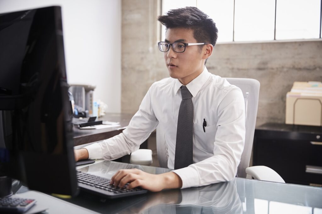 business man working on computer in office